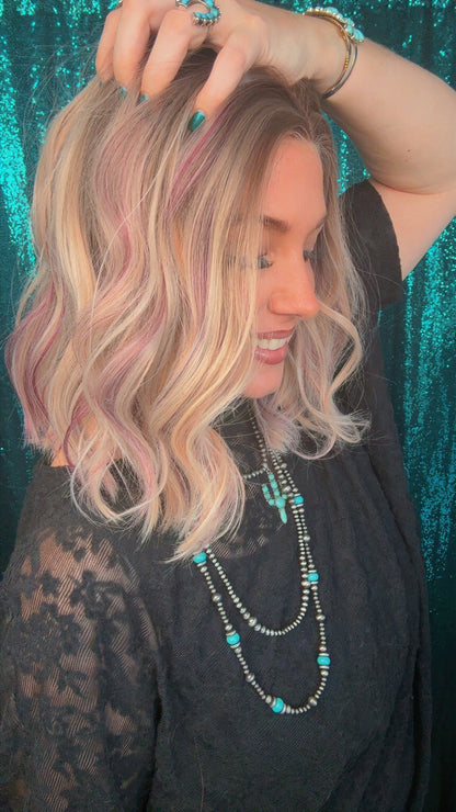 Tinsley Sugarplum Pearl | 13x4 Free Part | Lace Front | 18 Inches | 130% Density | Synthetic Futura
Fiber | Standard